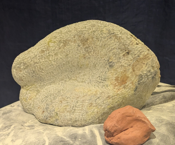 a sculpture depicting abstract shapes