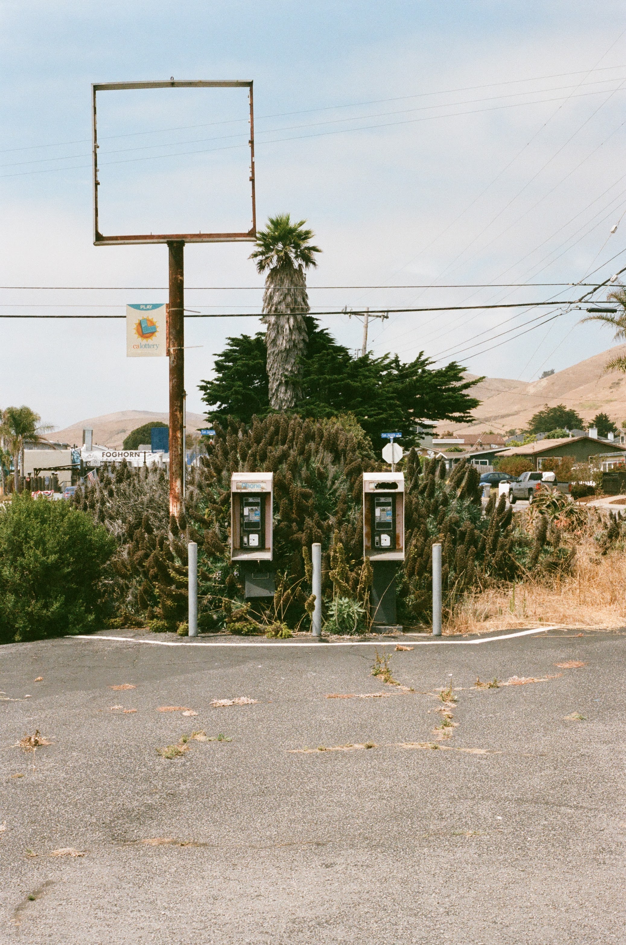 a 35mm photo of some payphones